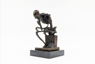 CONTEMPORARY SCHOOL SCULPTURE, in bronze, skeleton in a thinking pose, 24cm H.