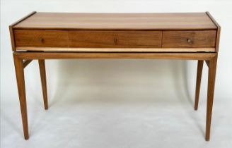 A YOUNGER WRITING TABLE, 1970s teak with three frieze drawers and tapering supports (stamped to
