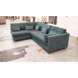 CORNER SOFA, turquoise upholstery, raised on bun supports, 225cm W x 180cm D x 85cm H.