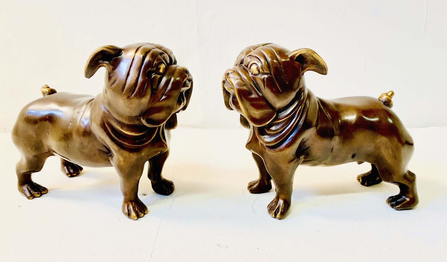 BULLDOGS, a pair, in bronze, 29cm H x 38cm L (2)