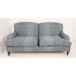 KINGCOME STRATFORD SOFA, in blue upholstery on turned supports, 200cm W x 88cm H x 95cm D.