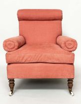 ARMCHAIR, Victorian Howard style with salmon upholstery, scroll arms and ring turned supports,