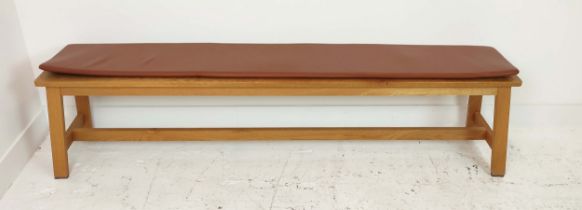 DE LA ESPADA BENCH, with tan leather cushion, 180cm L x 43cm H x 32cm W.