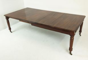DINING TABLE, extendable Victorian mahogany with turned facetted supports on castors, 123cm x