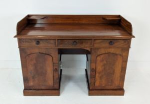 DESK, Victorian mahogany with a 3/4 gallery over three frieze drawers and cupboard base, 122cm x