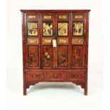 CHINESE WEDDING CABINET, in a decorative red lacquer finish depicting figural scenes and floral