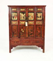 CHINESE WEDDING CABINET, in a decorative red lacquer finish depicting figural scenes and floral