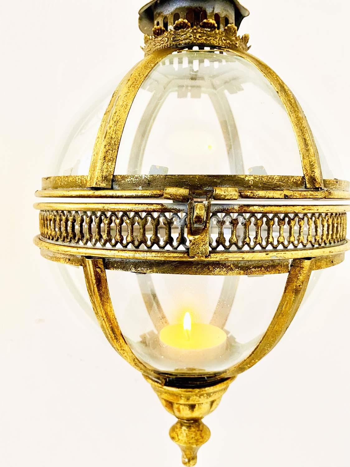 WALL HANGING GLOBE CANDLE LANTERNS, a pair, Regency style gilt metal, 80cm H x 25cm. (2) - Image 4 of 4