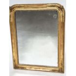 WALL MIRROR, 19th century French Napoleon III giltwood and gesso moulded, arched with foliate