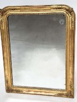 WALL MIRROR, 19th century French Napoleon III giltwood and gesso moulded, arched with foliate