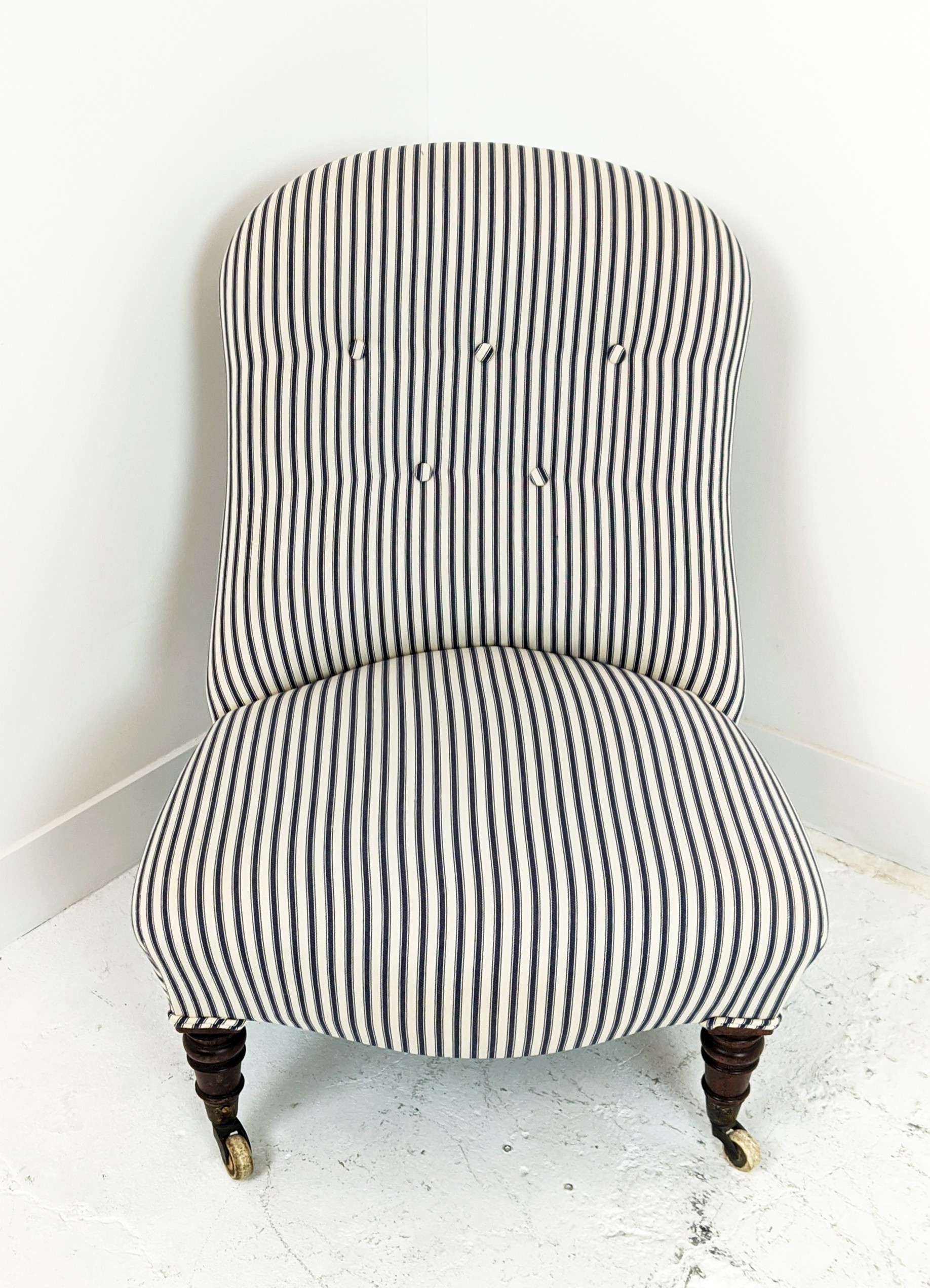 SLIPPER CHAIR, Victorian mahogany in blue and white ticking, 82cm H x 78cm x 62cm. (front castors - Image 2 of 6