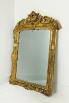 WALL MIRROR, mid 19th century French giltwood and gesso frame with shell crest, 118cm H x 79cm W.