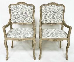 FAUTEUILS, a pair, French Louis XV style grey painted with eucalyptus print linen upholstery, 99cm H