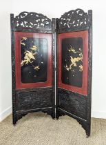 SCREEN, two fold Japanese, circa 1900, with a carved frame, and decorative lacquered panels with