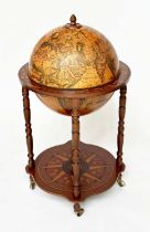 GLOBE COCKTAIL CABINET, in the form of an antique terrestrial globe on stand with rising lid and