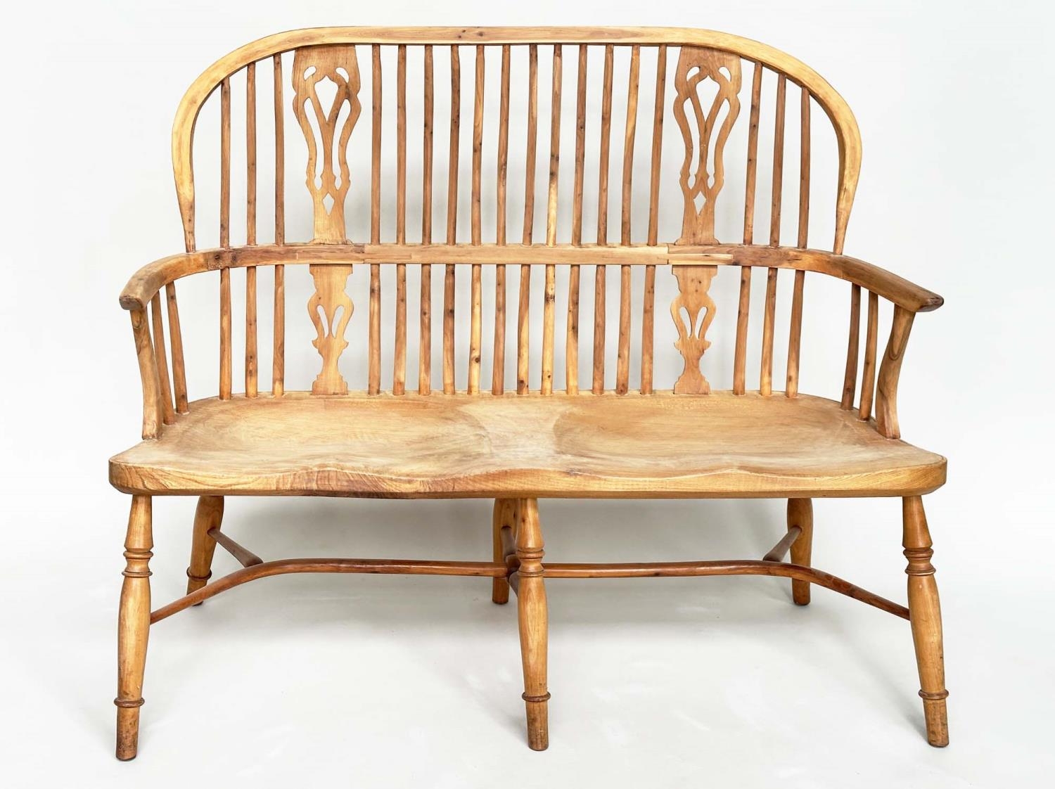 HALL SEAT, antique style English yewwood and elm, with twin pierced splat hoop back and carved