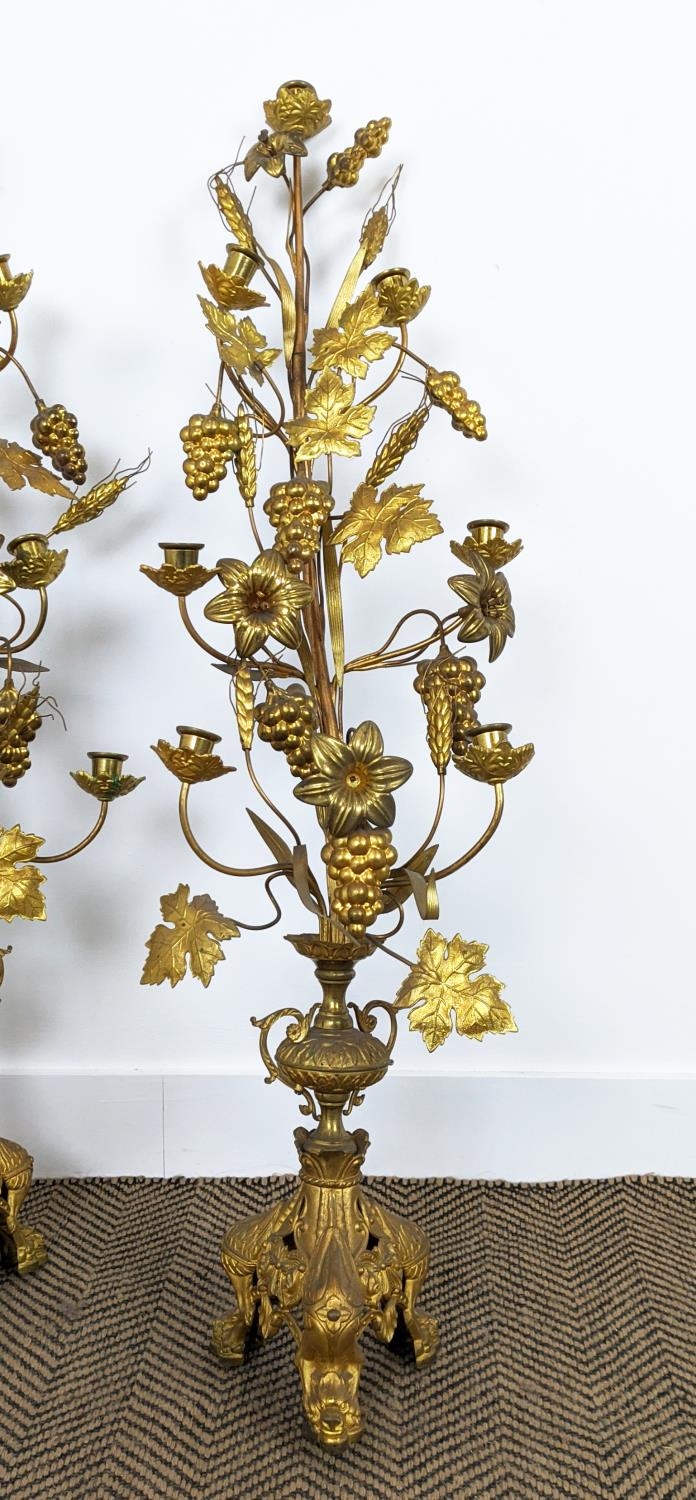 TABLE CANDLABRAS, a pair, each 107cm H x 33cm W, gilt metal with grain and grape detail, with candle - Image 2 of 5