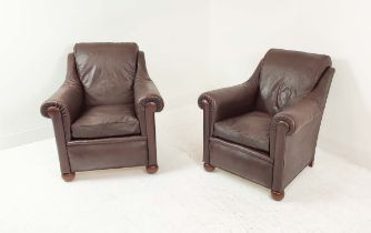 CLUB ARMCHAIRS, a pair, early 20th century French, stitched tan leather, 74cm H x 80cm W. (2)