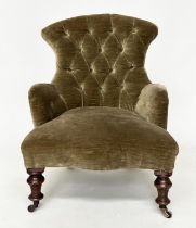 ARMCHAIR, Victorian green velvet upholstered with buttoned back, serpentine front and turned