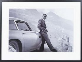 CONTEMPORARY SCHOOL PHOTO PRINT, of James Bond, framed and glazed, 63cm H x 83cm.