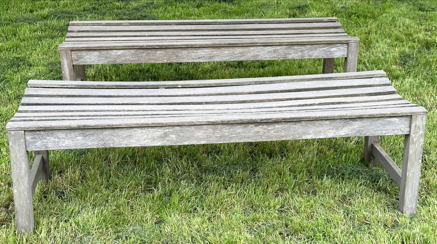 GARDEN BENCHES, a pair, well weathered teak and slatted, 140cm W x 50cm D x 44cm H. (2) - Image 5 of 6