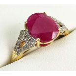 A 9CT GOLD RUBY AND DIAMOND RING, the mixed cut ruby stone claw set, diamond shoulders, ring size Q,