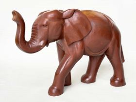 ELEPHANT, Indian carved well patinated solid elm, 83cm W x 63cm H.