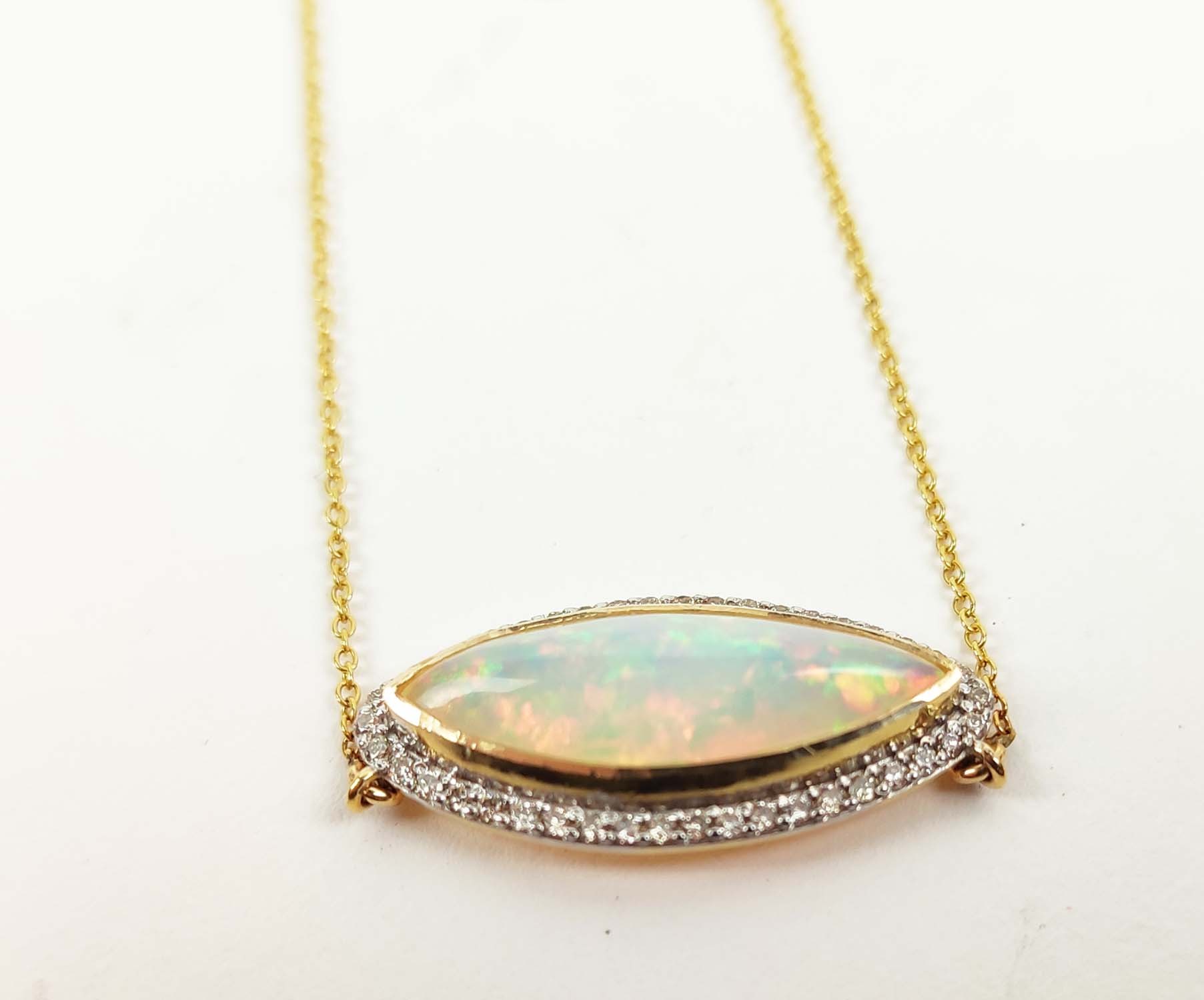 A 14CT GOLD OPAL AND DIAMOND SET PENDANT NECKLACE, the cabouchon opal surrounded by round - Image 2 of 4