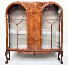 ART DECO DISPLAY CASE, burr walnut with two arched glazed doors enclosing shelves, 117cm W x 128cm H