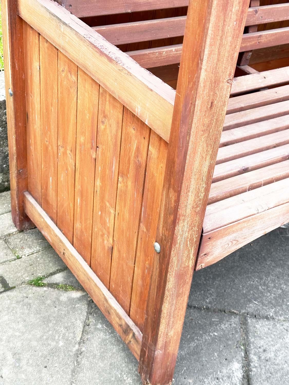 ARBOUR SEAT, traditional form well weathered wood with slatted seat and boarded gable roof, 138cm - Image 3 of 5