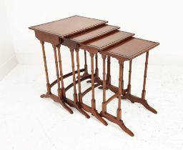 QUARTETTO TABLES, four, early 20th century Regency style mahogany on faux bamboo supports, largest