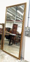 LARGE MIRROR, gilt frame with a bevelled plate, 105cm W x 212cm H.