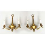 WALL SCONCES, a pair, 20th century gilt metal twin arm with pineapple finials, 40cm H. (2)
