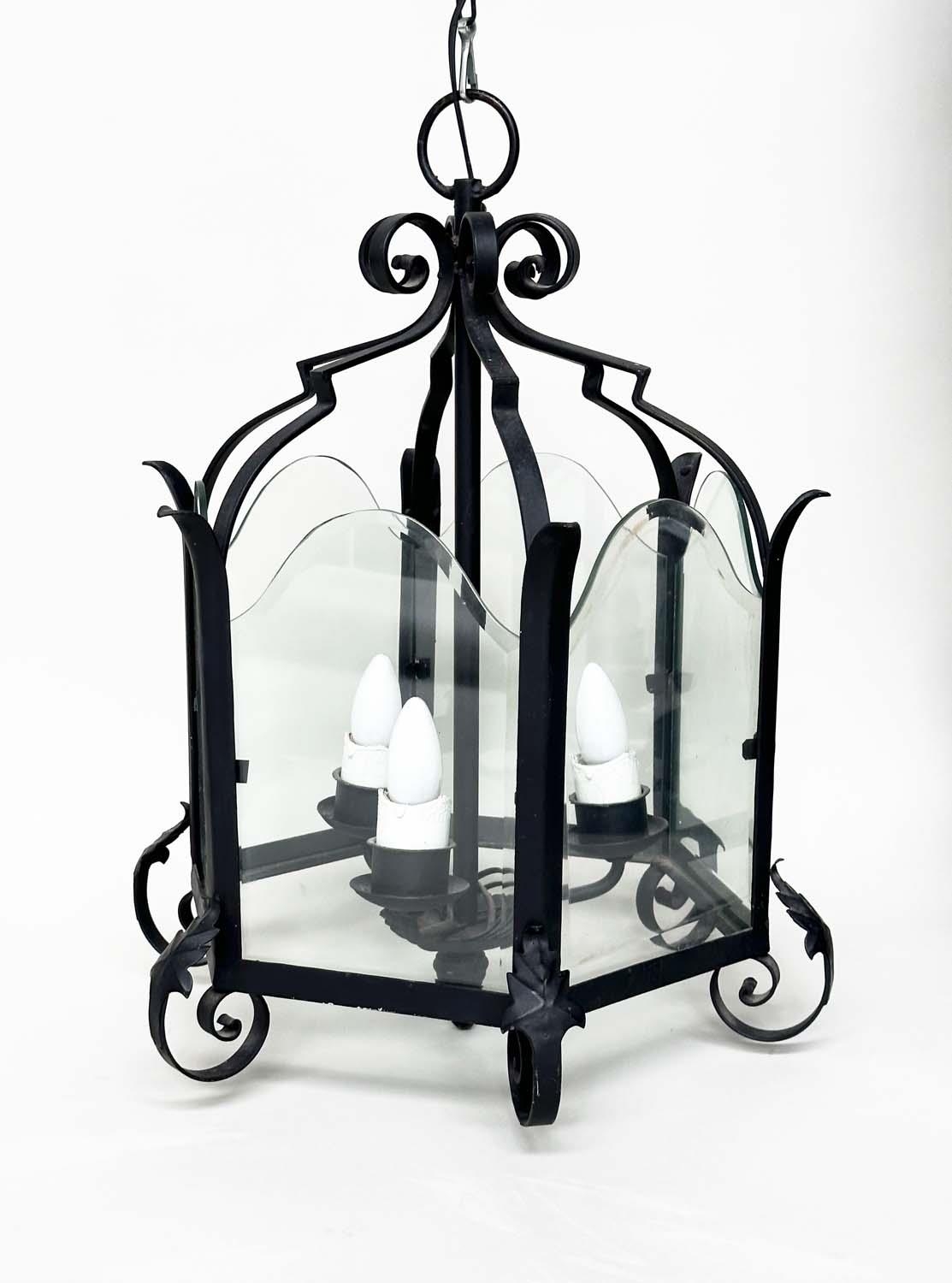 HALL LANTERN, Italian style hexagonal wrought iron and glazed with three branch fitting, 46cm W x