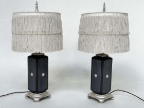 TABLE LAMPS, a pair, Versace style black with silvered lion mask and base detail with 'tassle'