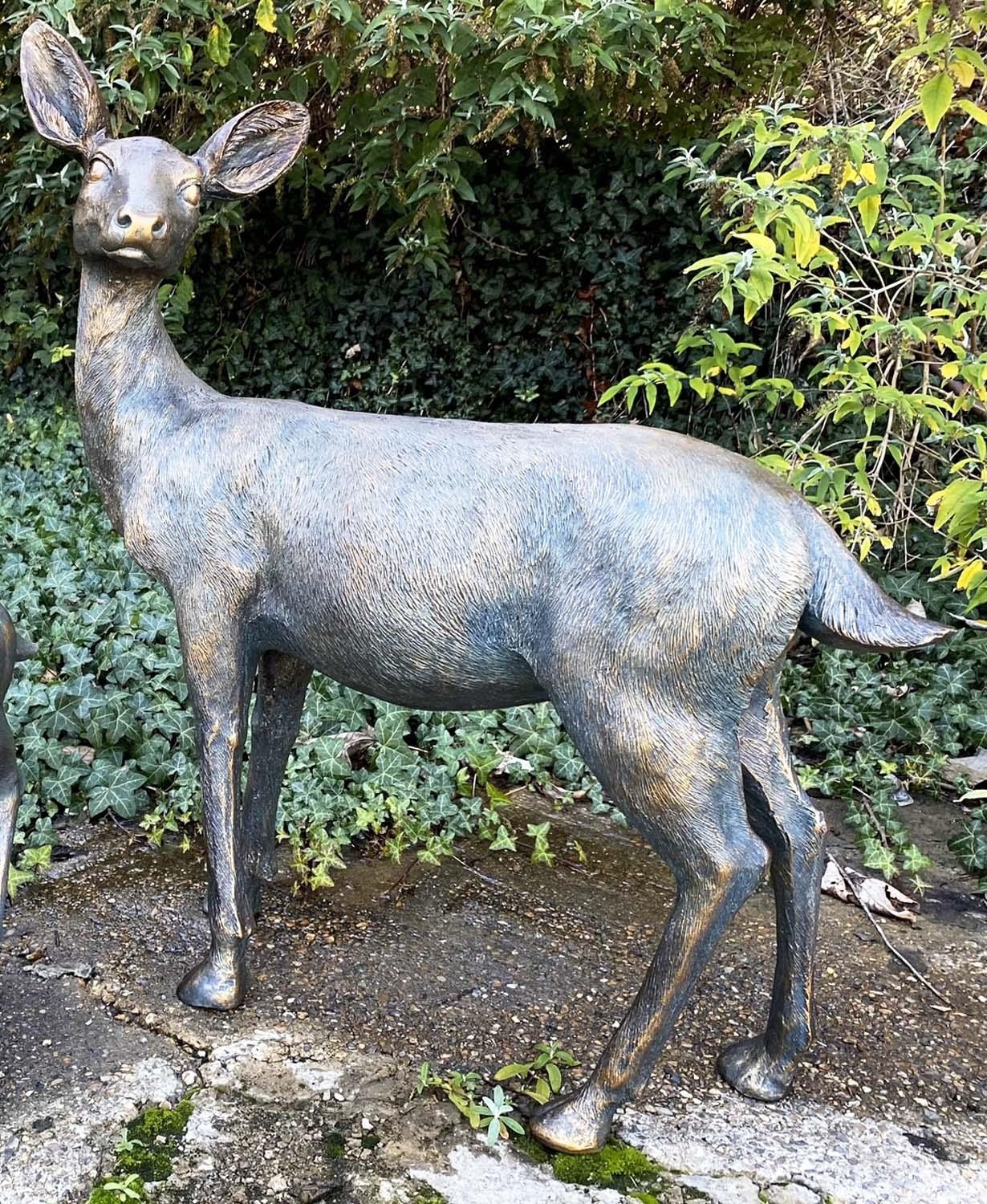 GARDEN DOE STATUE, resin, in a bronze finish, 90cm H x 80cm x 35cm.