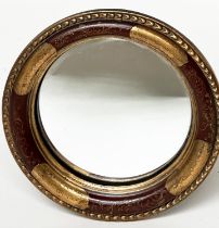 VENETIAN WALL MIRORR, early 20th century giltwood, circular with convex mirror plate and hand