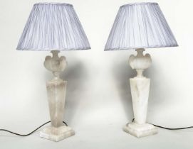 ALABASTER LAMPS, a pair, Italian alabaster each with urn surmount and facetted graduated column,
