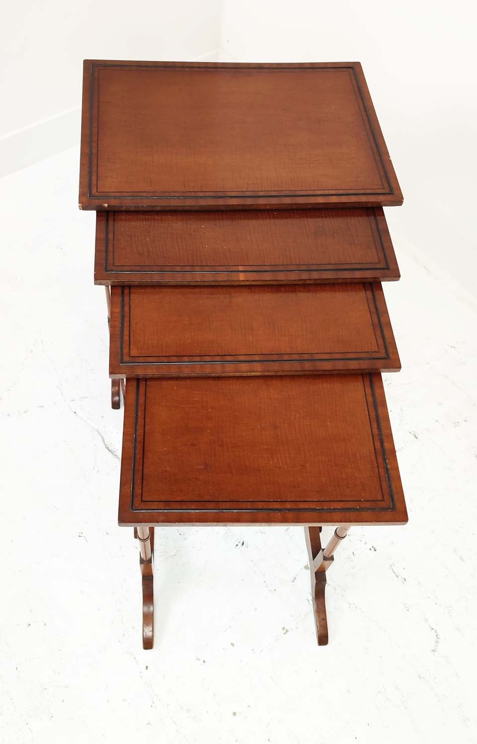 QUARTETTO TABLES, four, early 20th century Regency style mahogany on faux bamboo supports, largest - Image 2 of 5