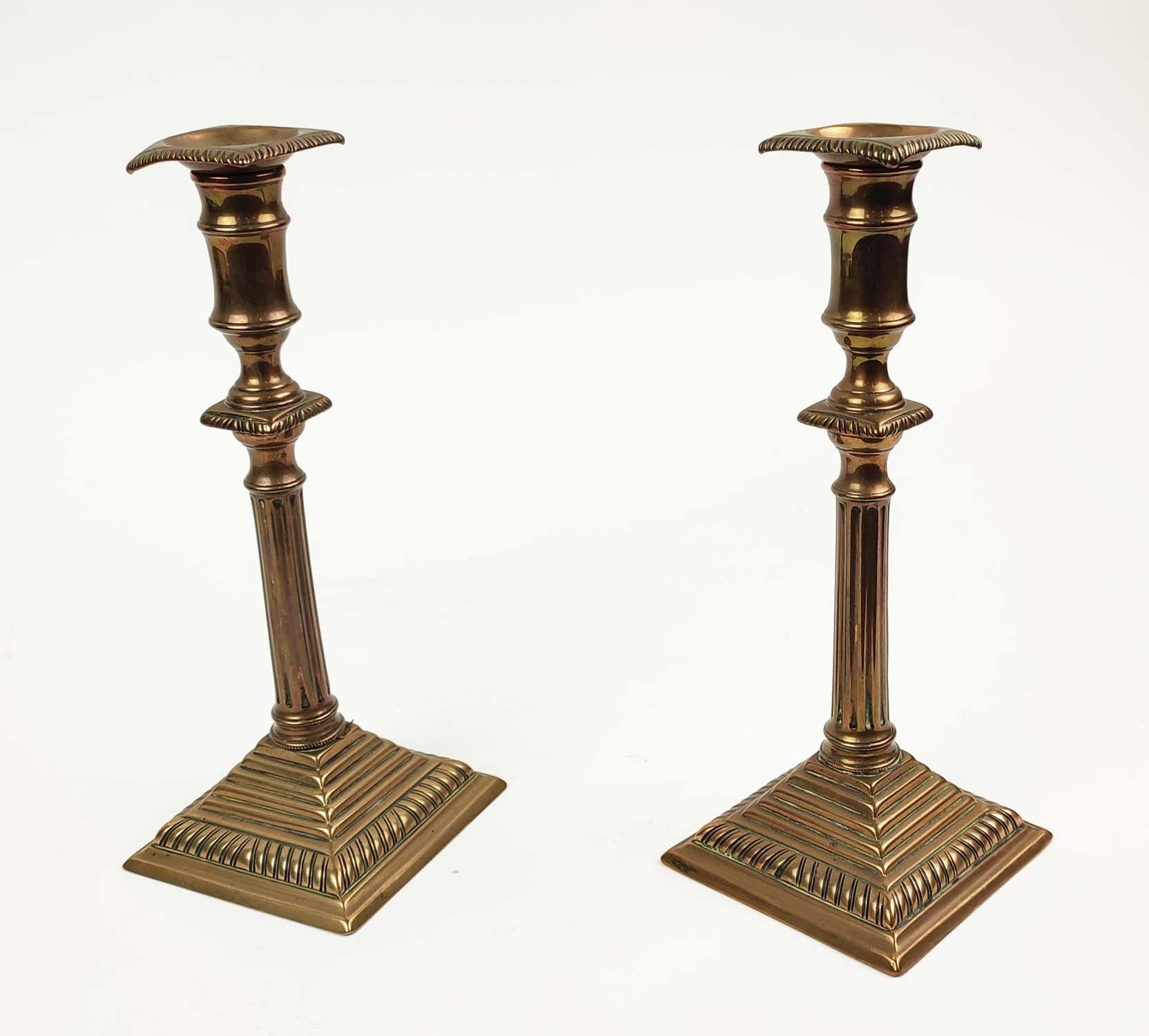 A PAIR OF GEORGE III BRASS CANDLESTICKS, in the Adamesque style, each 26cm H. - Image 2 of 6