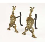 A PAIR OF VICTORIAN BRASS FIRE DOGS, made by William Tonks and Sons, circa 1880, 27cm H x 22cm D.