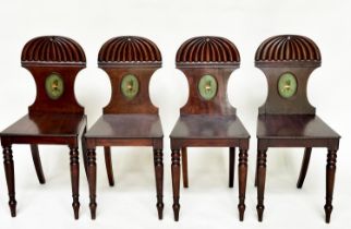 HALL CHAIRS, a set of four, Regency mahogany gadrooned with inset oval hand painted armorial panels,