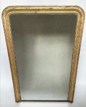 OVERMANTEL MIRROR, 19th French Napoleon III giltwood and gesso moulded, arched with incised and