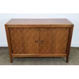 GORDON RUSSELL DOUBLE HELIX SIDEBOARD, circa 1950, sapele and teak with two doors, 84cm H x 122cm