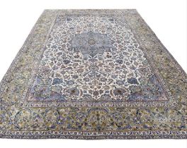 ANTIQUE PERSIAN KASHAN CARPET, 528cm x 397cm.