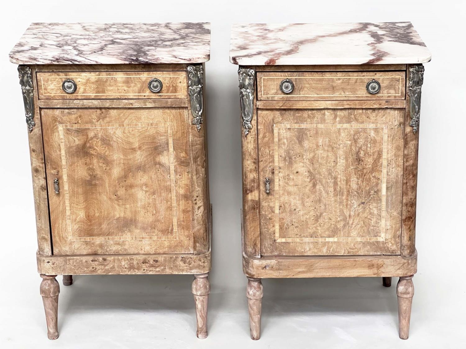 TABLES DE NUIT, a pair, 19th century French walnut and silvered metal mounted each with breche