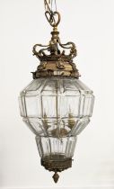 HALL LANTERNS, a pair, brass and glass with lion head detail, 65cm H. (2)