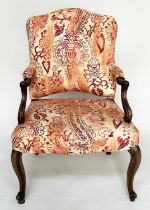 ARMCHAIR, 18th century Italian walnut arched back, shaped arms and cabriole supports, 66cm W.