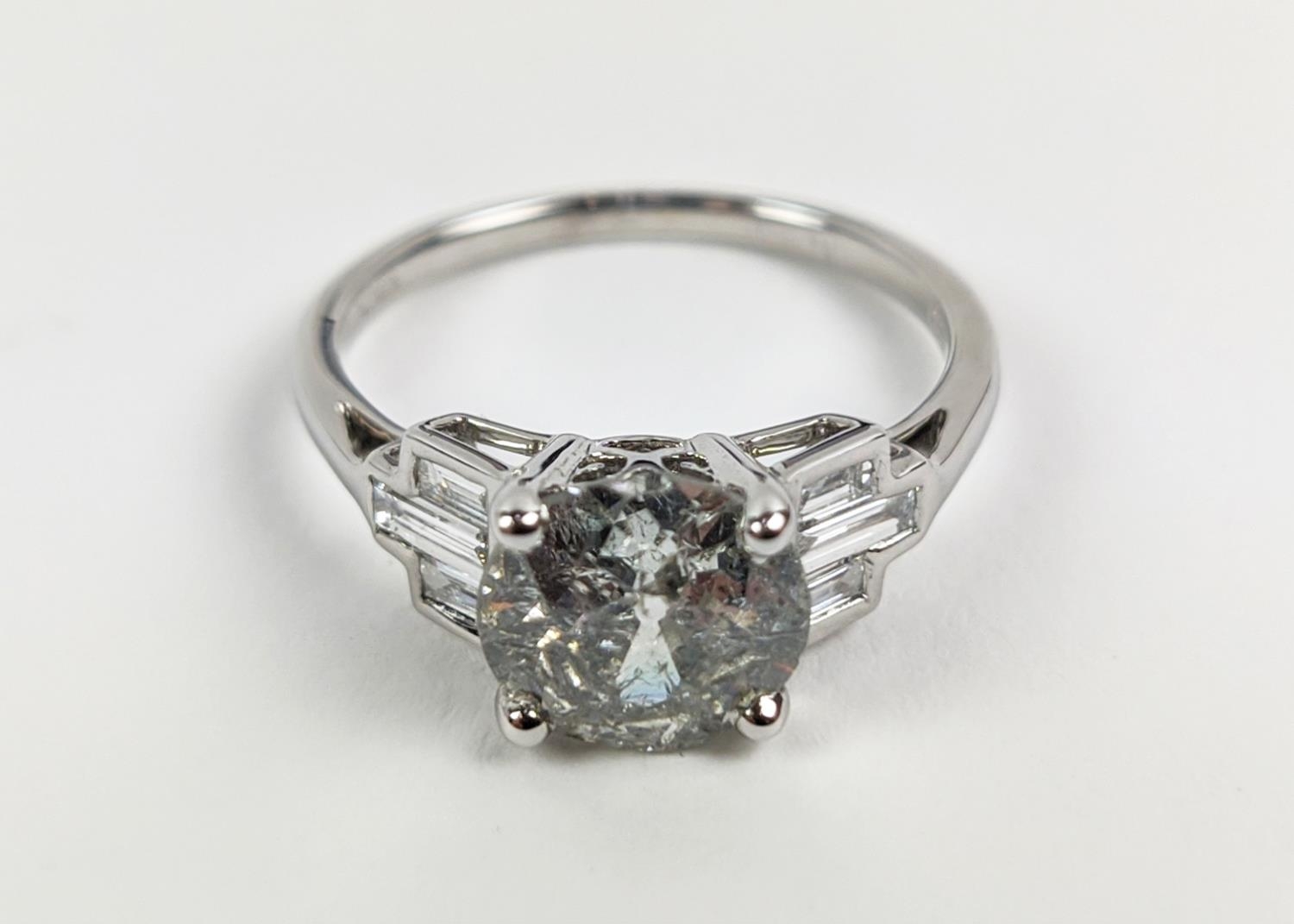 AN 18CT WHITE GOLD DIAMOND SOLITAIRE RING, with baguette cut diamonds to shoulders, the central - Image 5 of 9