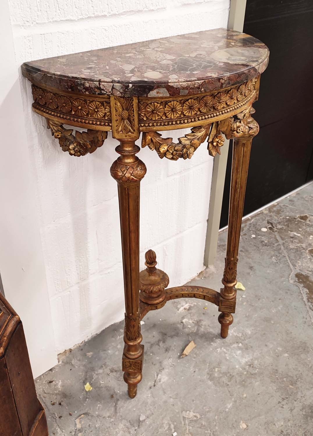 DEMI LUNE CONSOLE TABLE, French, circa 1880, with variegated marble top on carved giltwood base,